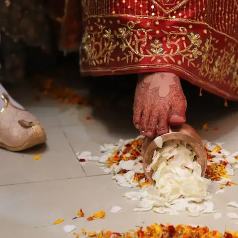 Traditional Indian wedding ritual with flower petals